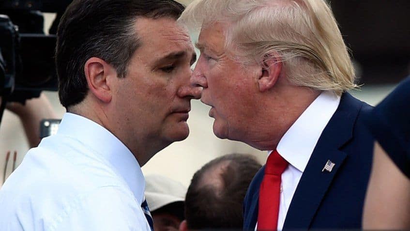 Donald Trump and Ted Cruz talking with their faces very close together