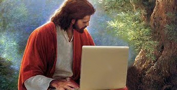 Jesus is shown using a laptop