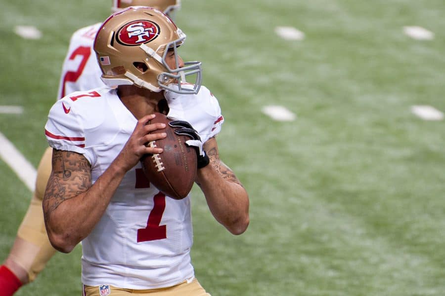 Colin Kaepernick getting ready to throw the ball during a San Francisco 49ers game.