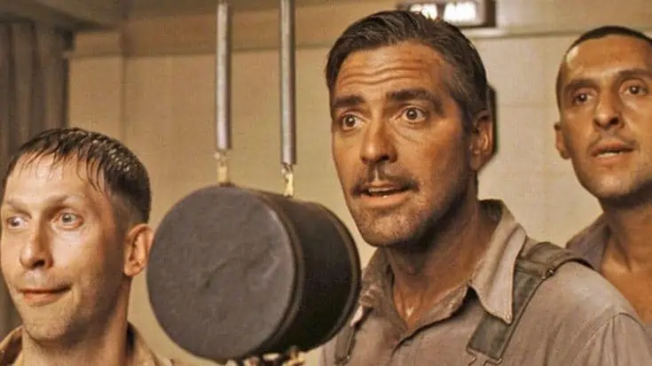 George Clooney and two other male characters from O Brother Where art Thou are shown in this screen grab image.
