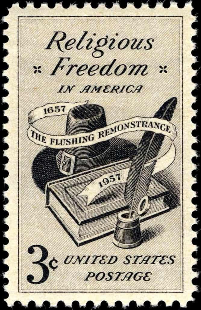 An old looking stamp image with a book and pen and a banner talking about freedom in America.