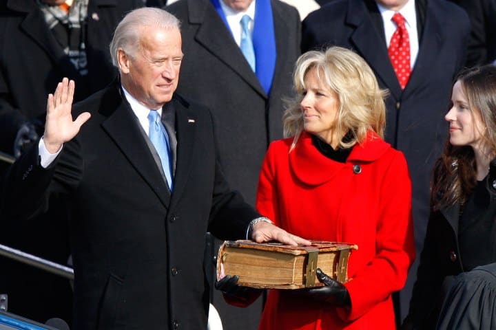 U.S. Vice President Joe Biden, left, is sworn in as his wife