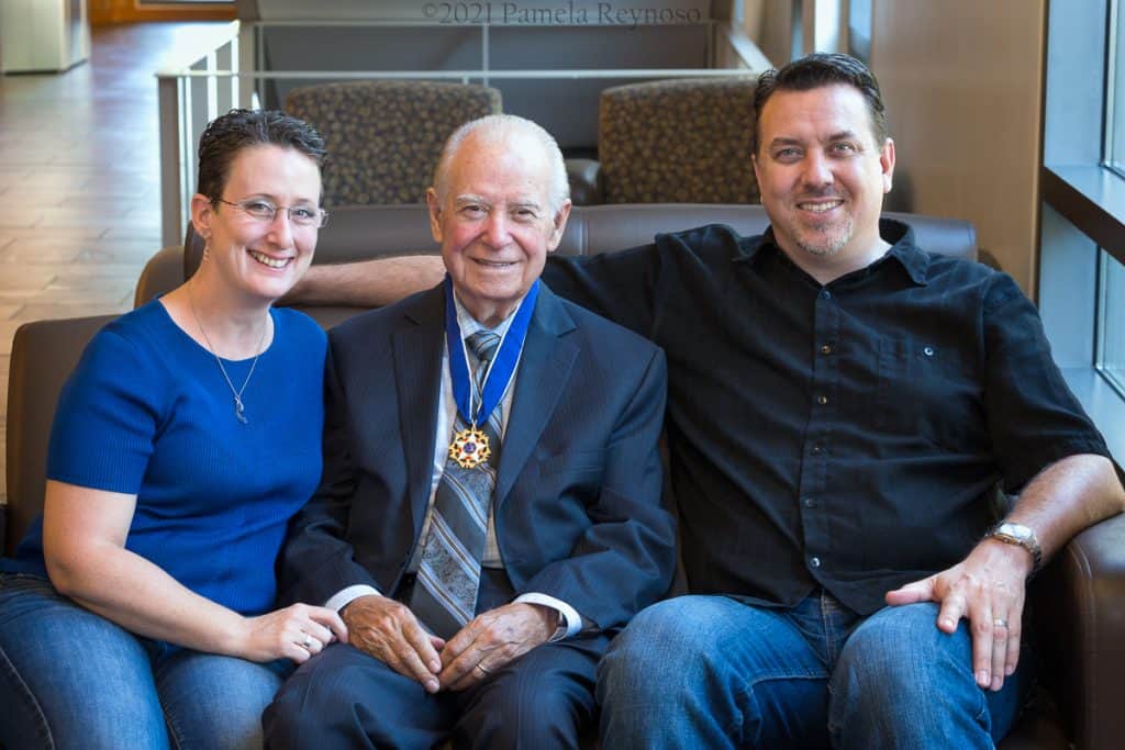 Cruz Reynoso wearing his Presidential Medal of Freedom with Rondall and Pamela Reynoso