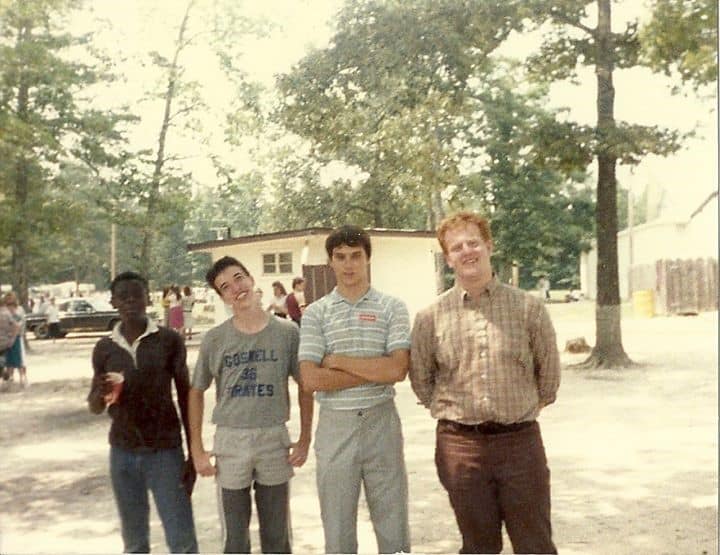 The author and four teenage friends are shown outside in an old photo.