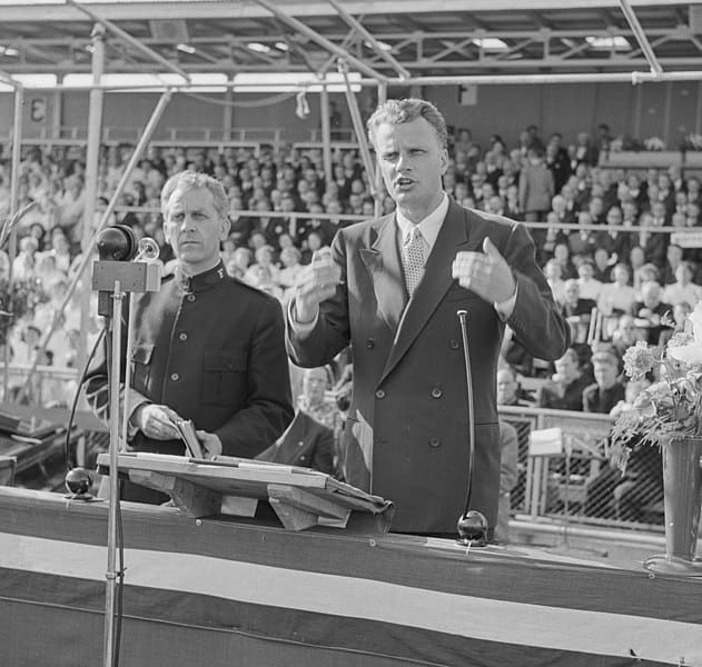 Billy Graham is shown in this black and white image as he speaks.