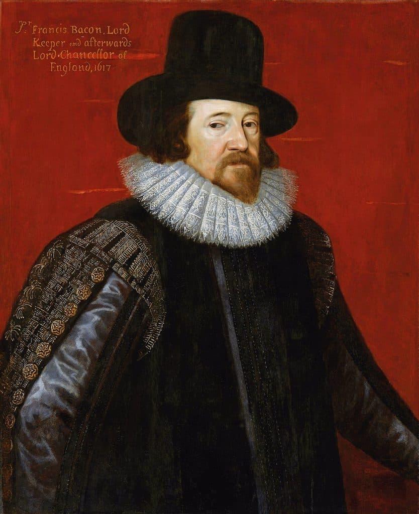 Francis Bacon is shown in a black top hat, black cape, and white neck collar of his era.