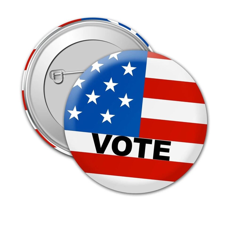 Two 'Vote' buttons with the American flag are shown, one frontside, the other backside.
