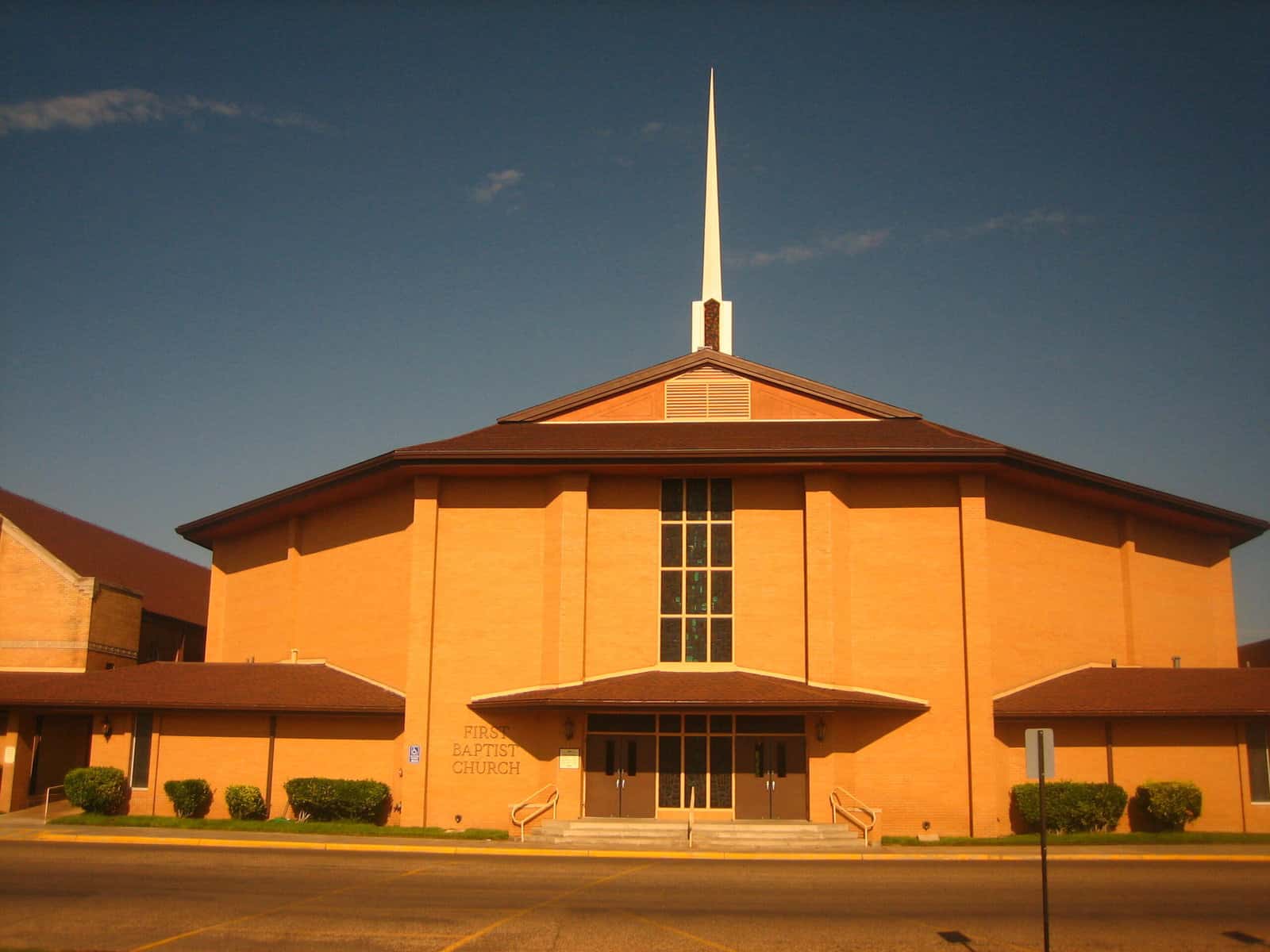 First Baptist Church in Dumas Texas is shown from the front.