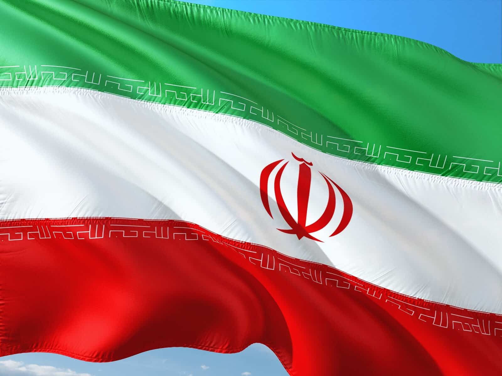 The flag of Iran is shown close up and blowing in the wind.