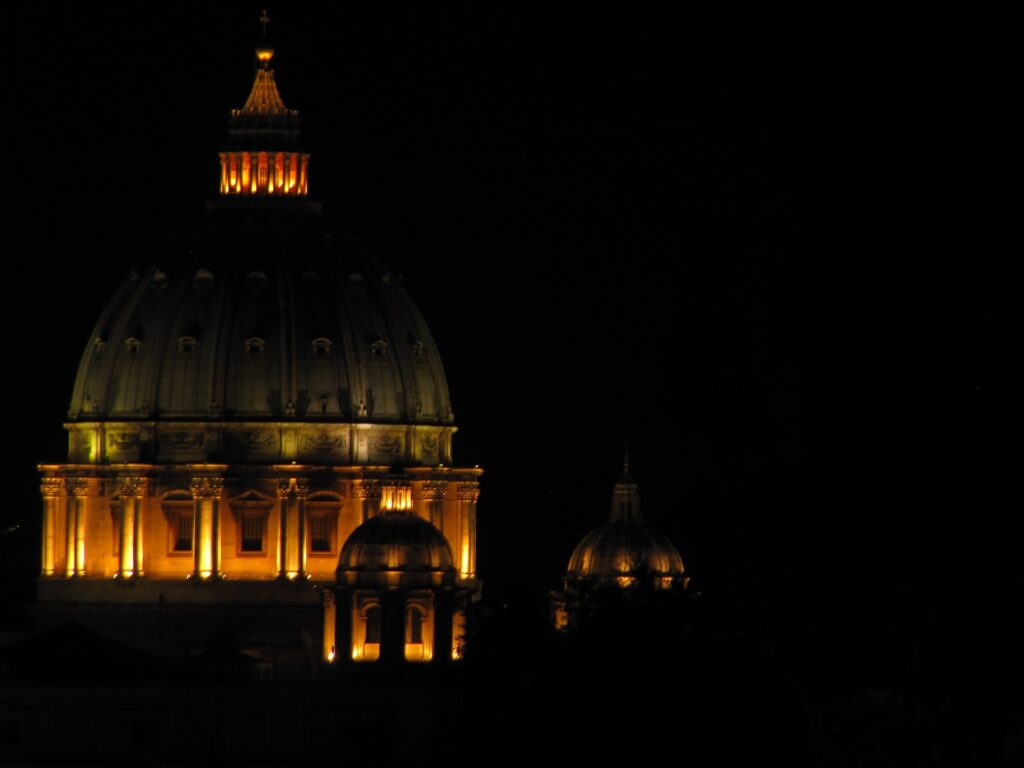 A night image of a dome in Rome.