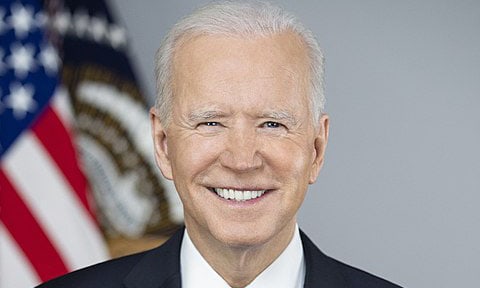 President Joe Biden poses for his official portrait Wednesday, March 3, 2021, in the Library of the White House.
