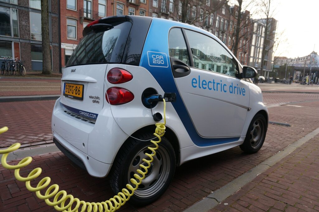 An electric car is shown charging.