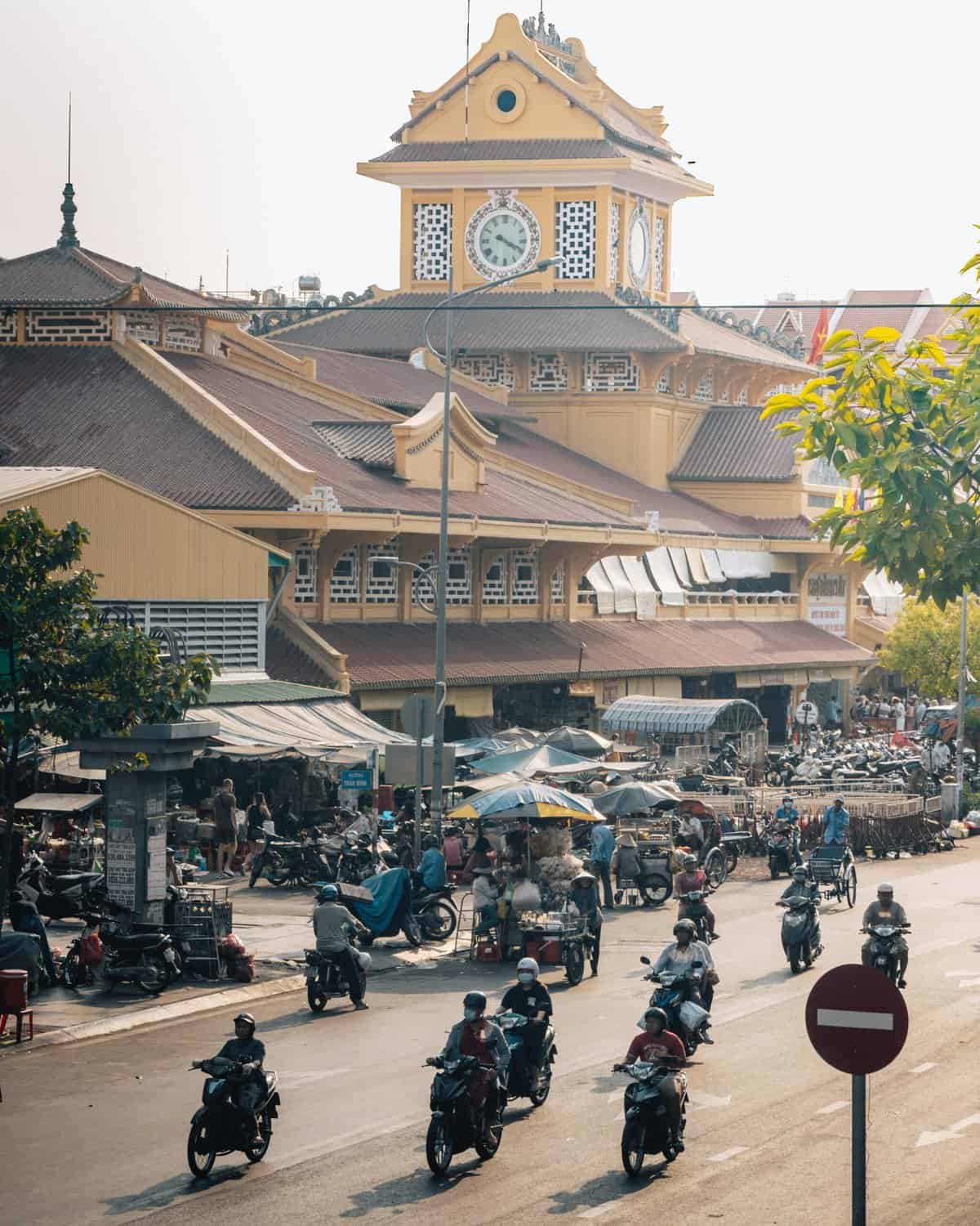 A street view in Vietnam filled with motorbikes.