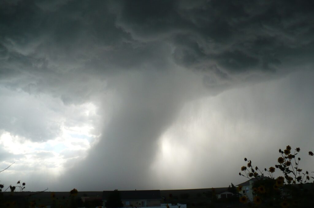 a grey photo of a tornado