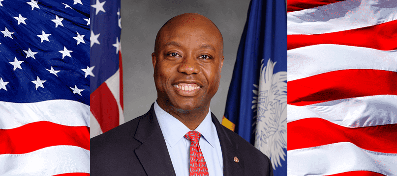 Senator Tim Scott is shown in a portrait with an American flag extending on both sides.