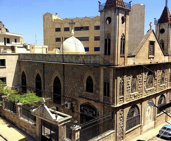 St. George the Martyr church in Aleppo is shown from above and to the side.