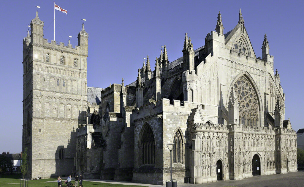 Exeter Cathedral is shown an angle from the front.