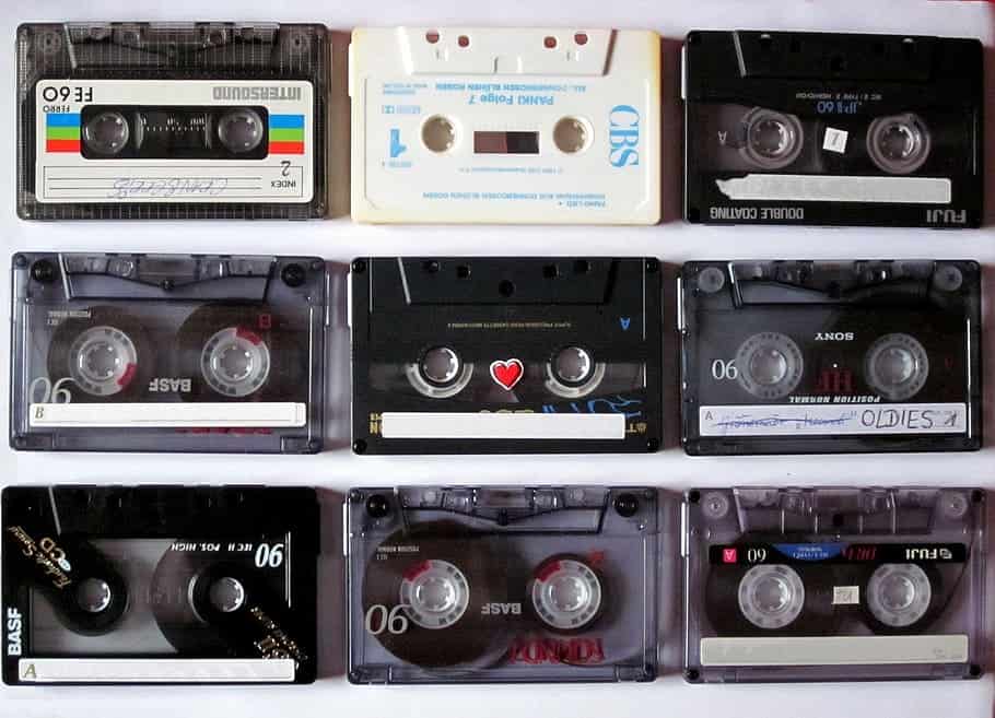 A grid of nine upside down vintage cassette tapes are shown.