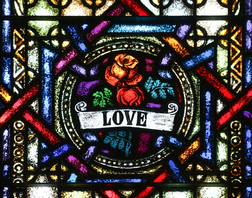 Love is written on a drawing of a stained glass window.