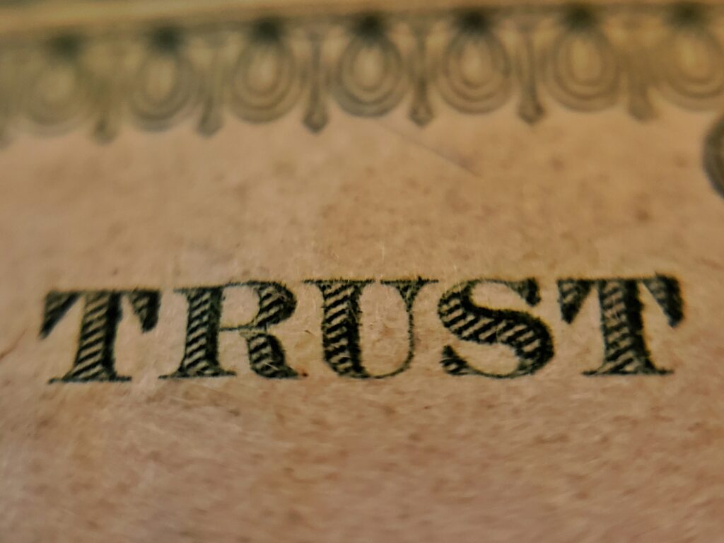 The word Trust as written on United States' paper currency.
