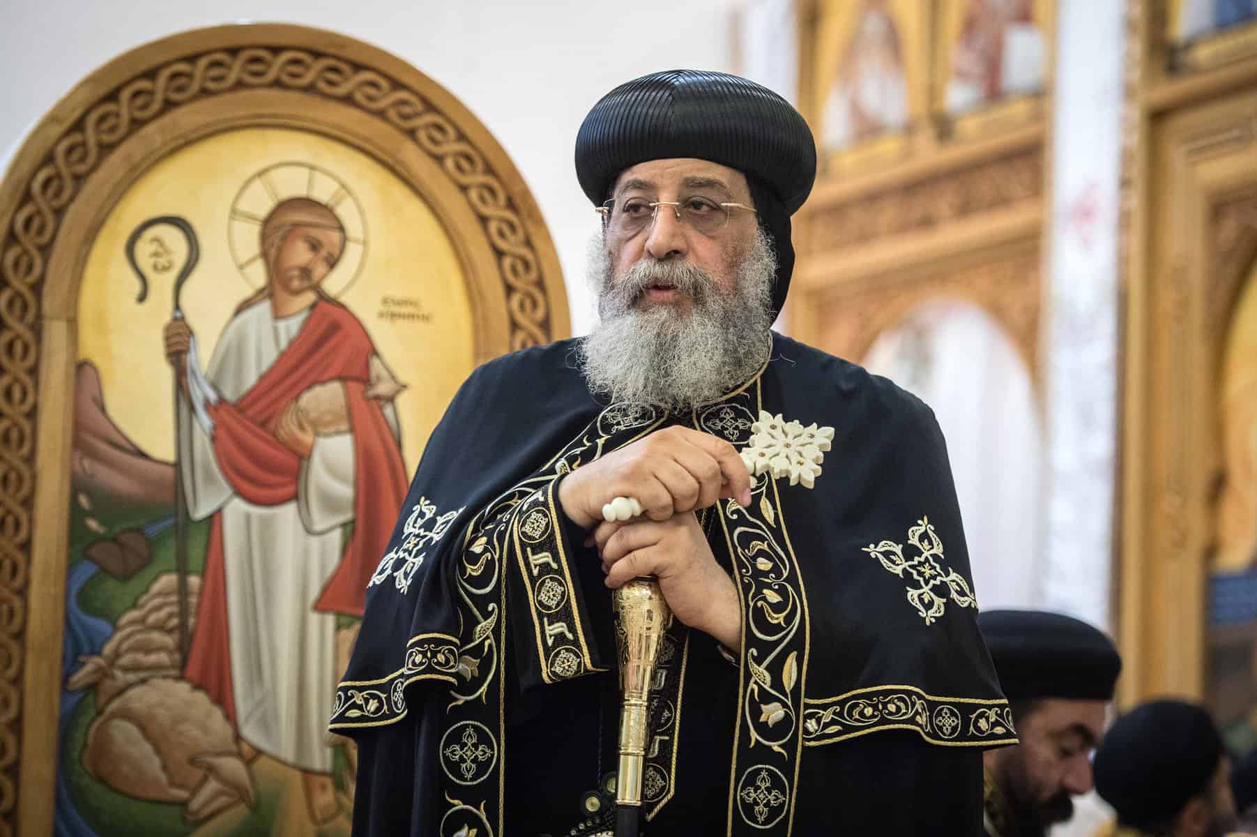 A Coptic Orthodox clergyman with grey beard.