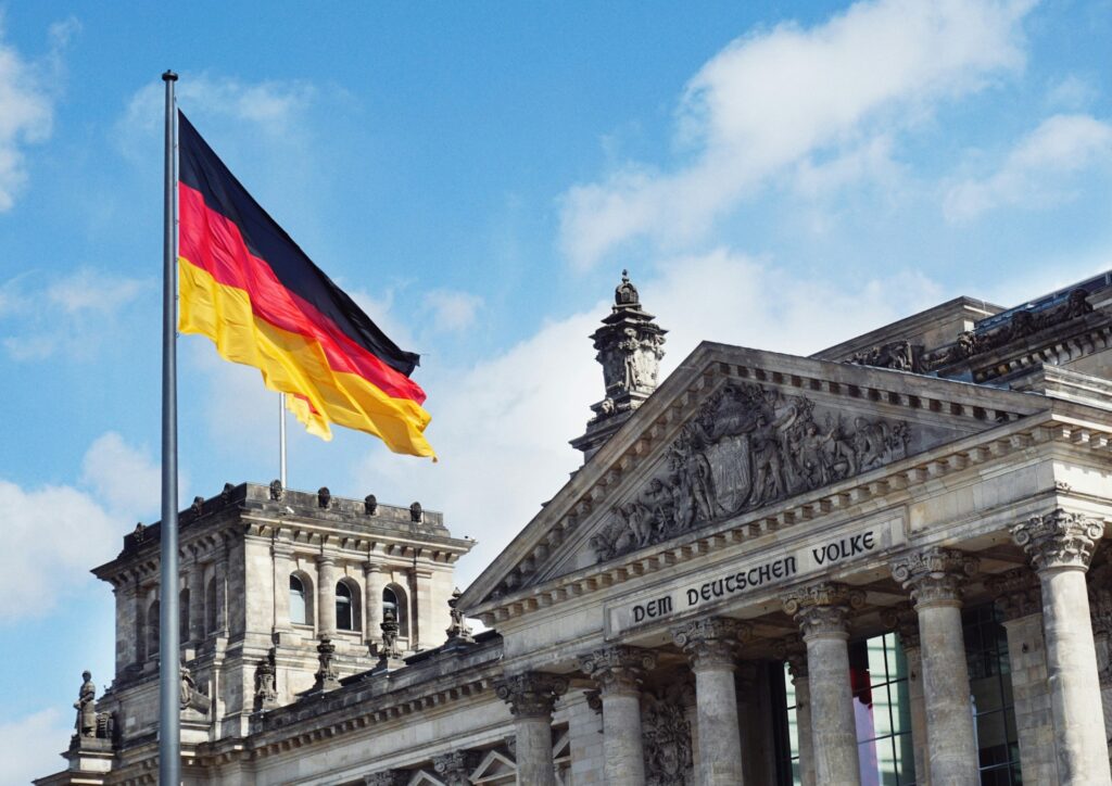 A German flag in front of a government building in Berlin.