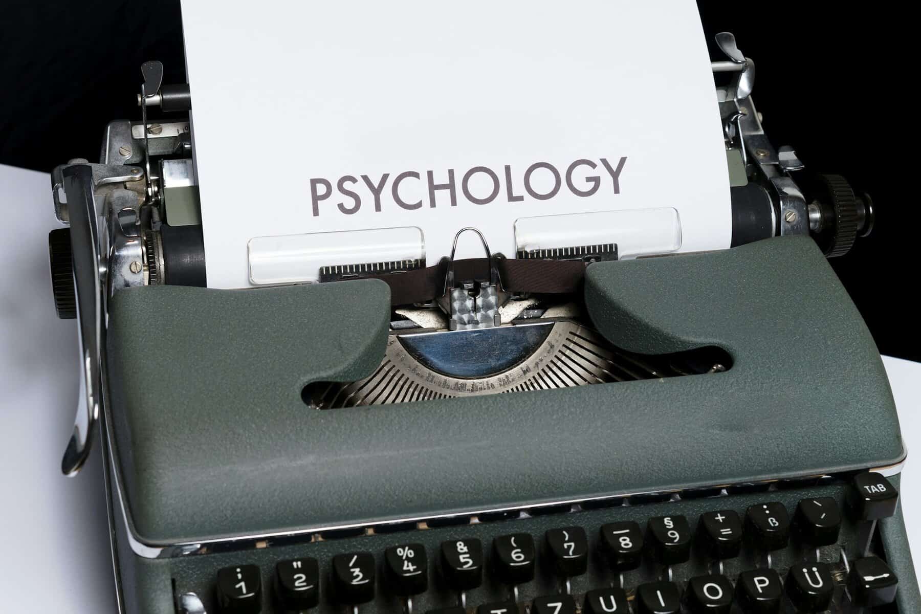 A typewriter with a paper that says Psychology