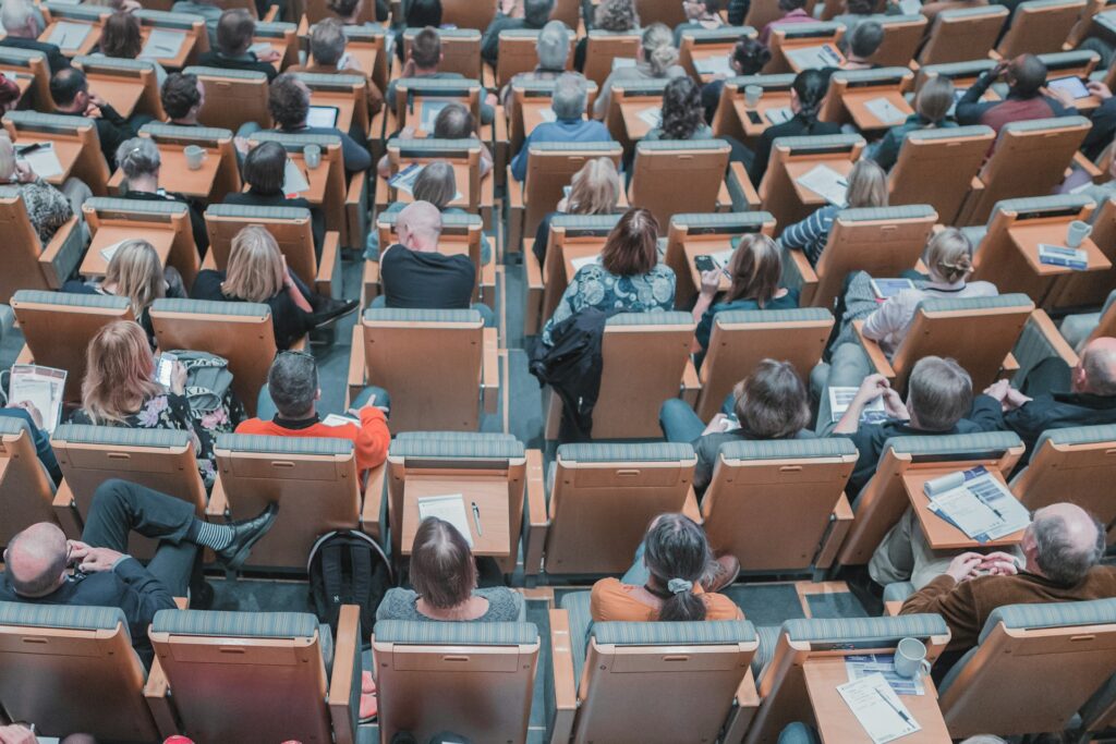 TMU turmoil: Bradley Reynolds indictment raises new questions A lecture hall filled with students as seen from behind.