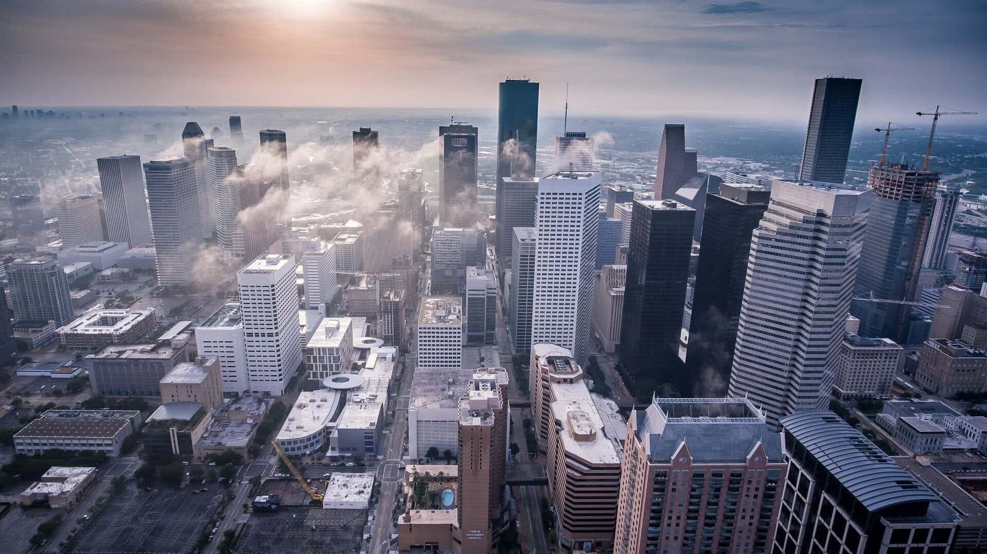 Aerial view of Houston, TX with wispy clouds.