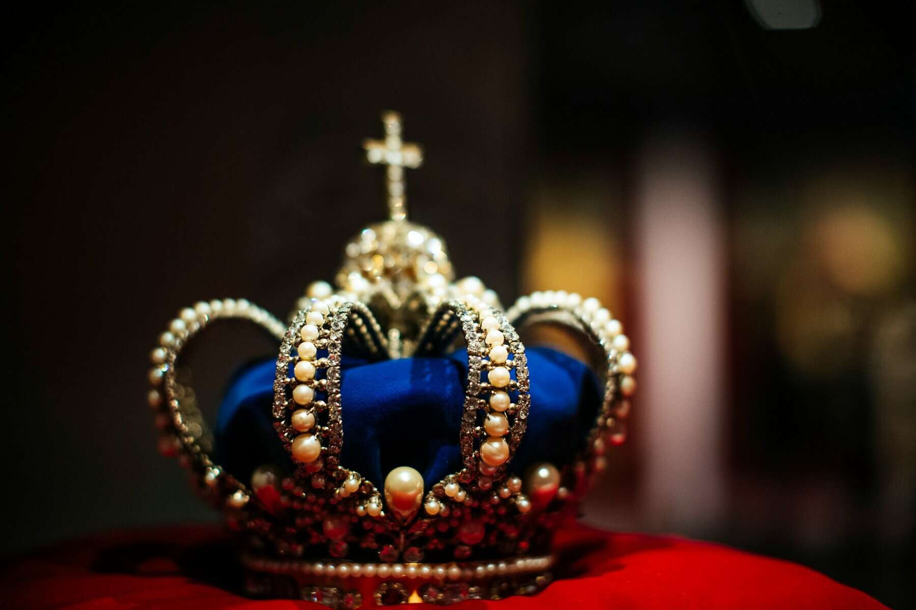 Crown of King Ludwig II. of Bavaria with blue velvet, pearls and diamonds topped with a diamond cross.