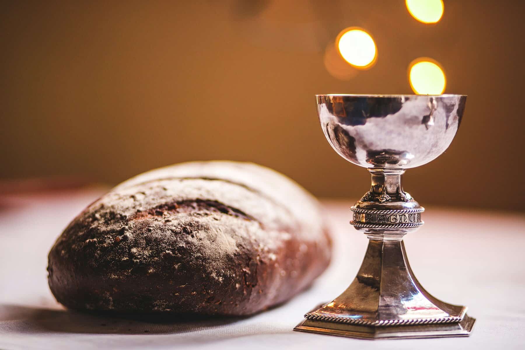 A chalice and loaf of bread for communion.