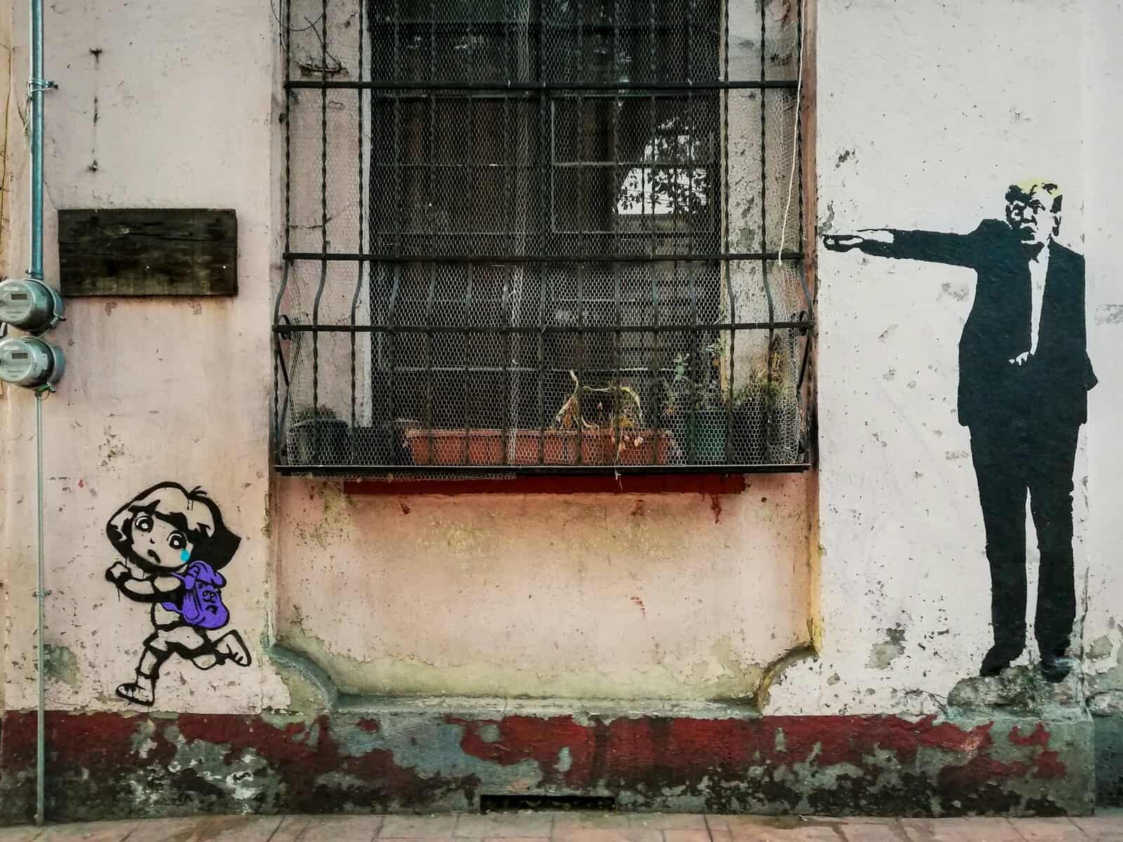 A Banksy like art piece with President Trump pointing a finger at Dora the Explorer and frowning as she runs away.