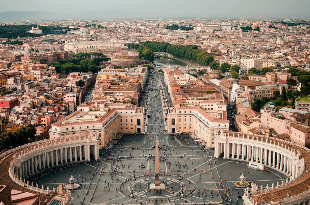 Easter address turns urgent as Middle East conflict spreads Vatican City seen from high above.