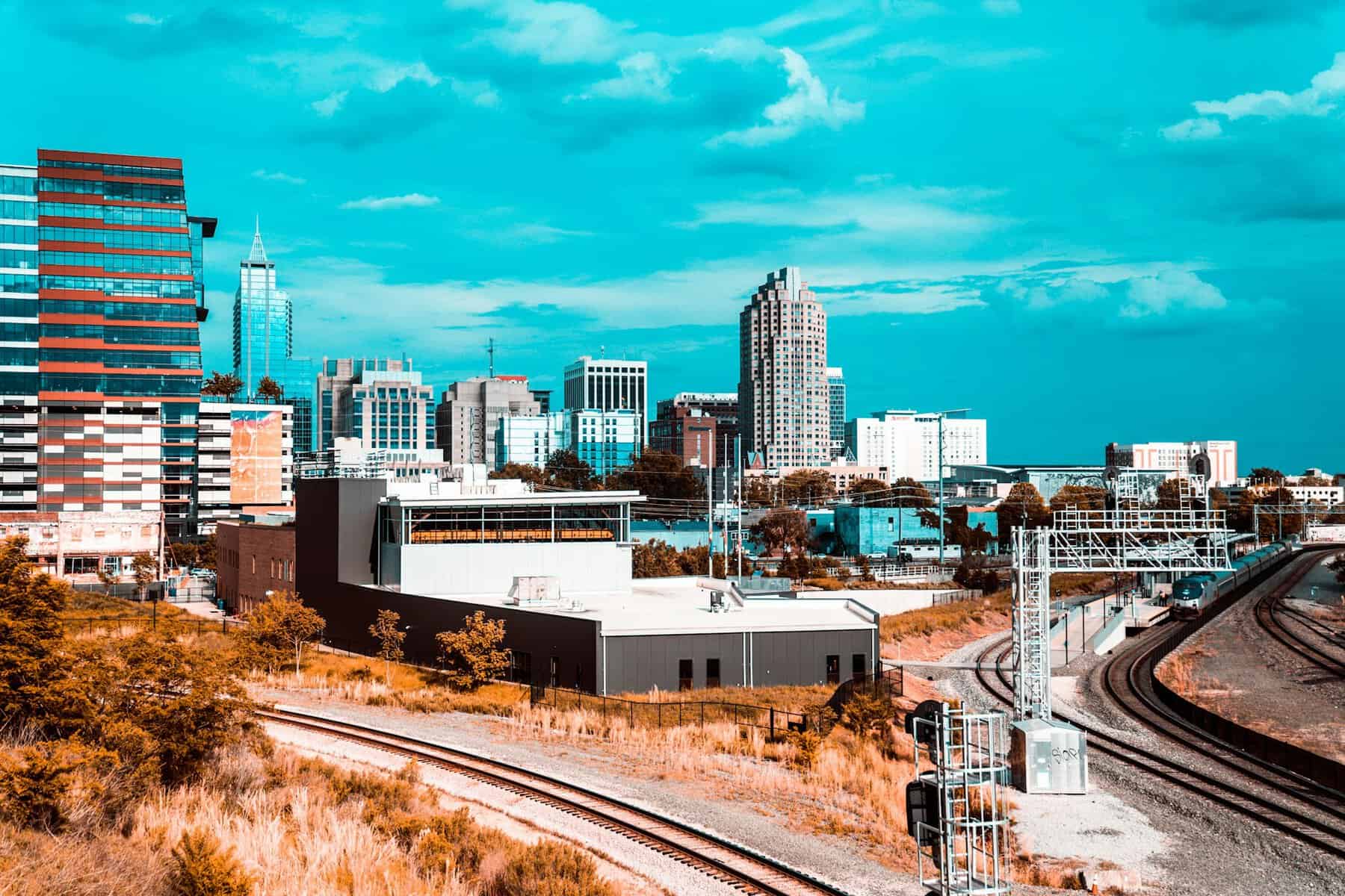 A skyline image of Raleigh, NC